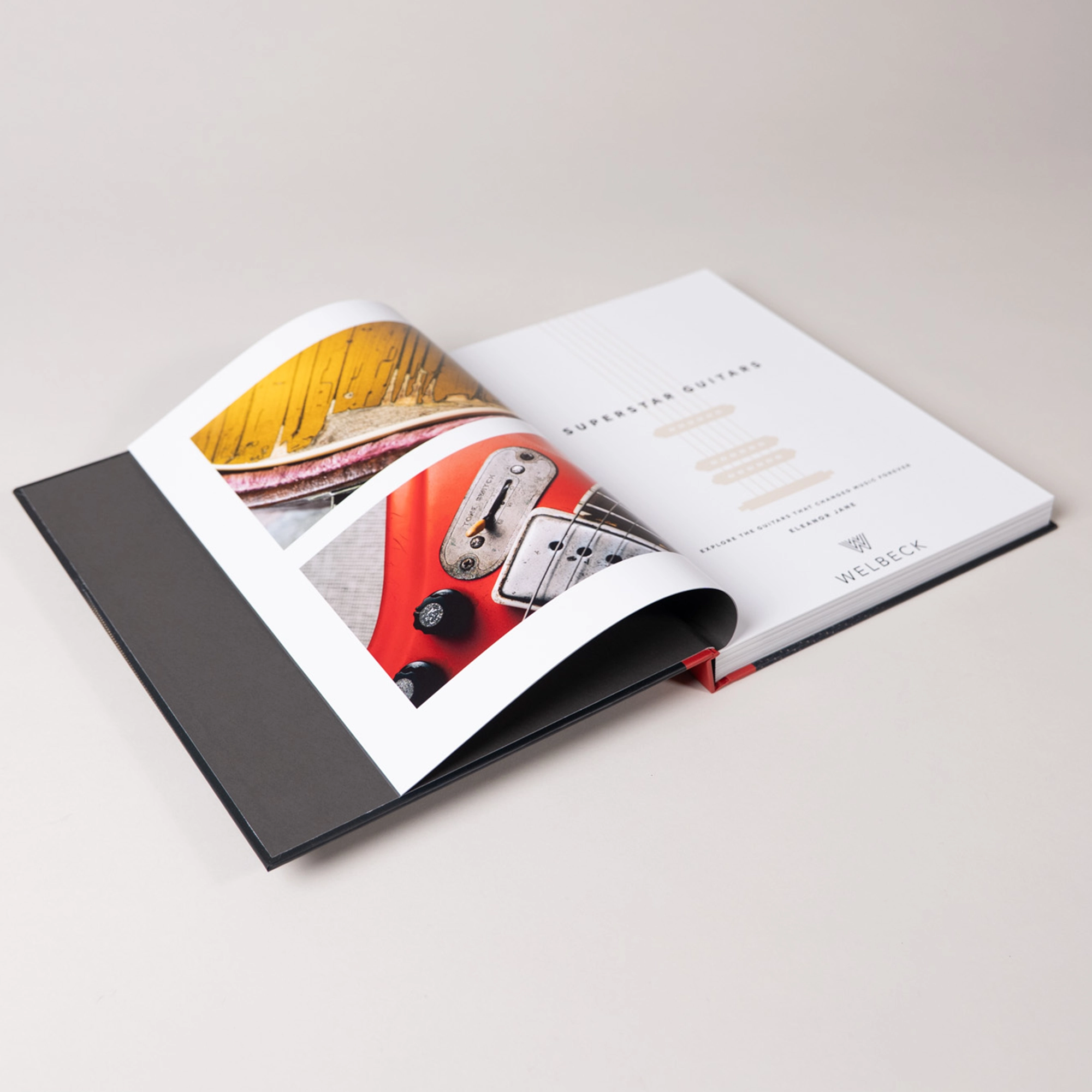 The title page, featuring close-up photography of guitars